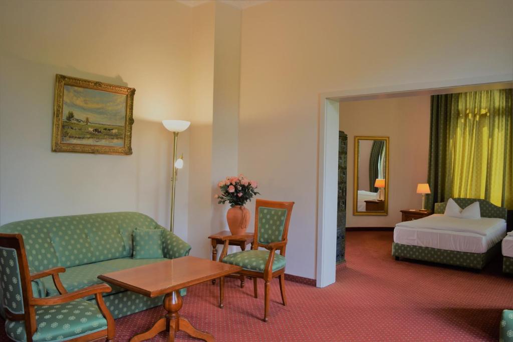Postel nebo postele na pokoji v ubytování Hotel Artushof