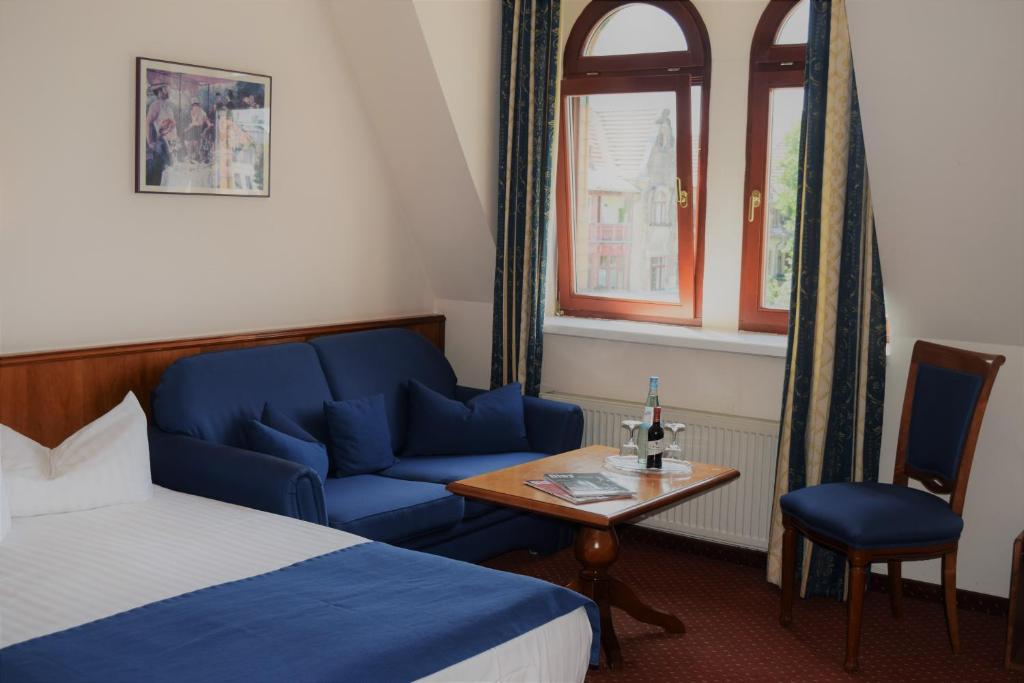 Postel nebo postele na pokoji v ubytování Hotel Artushof