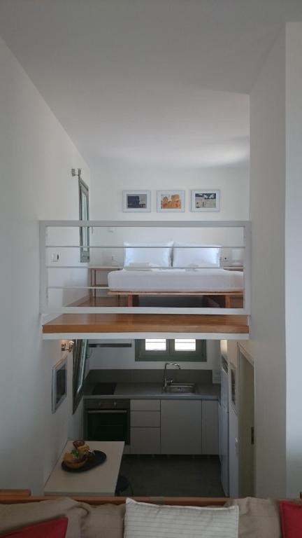 Postel nebo postele na pokoji v ubytování Sea Shelter