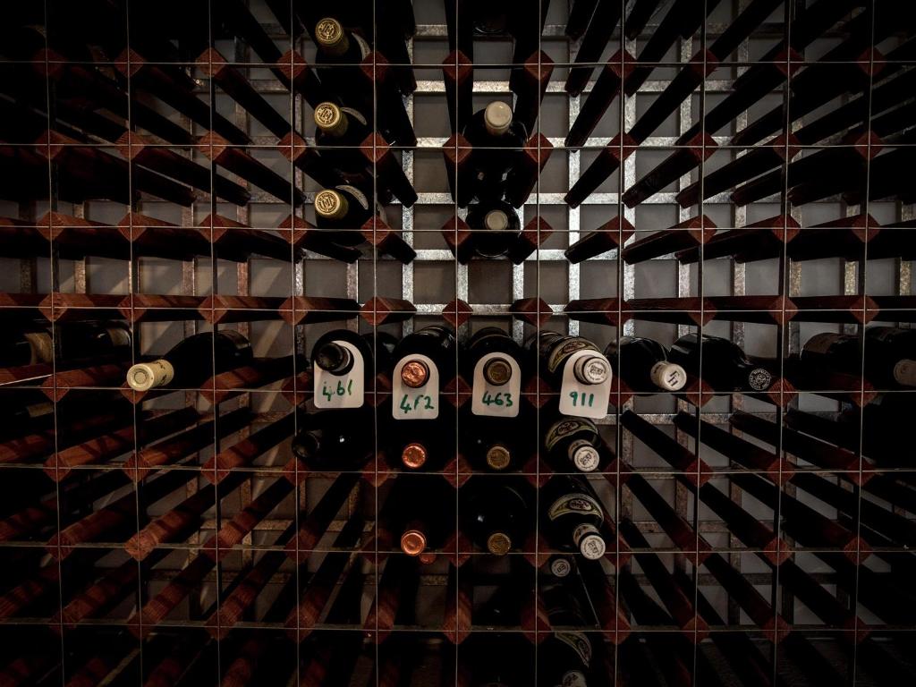 a wall of wine bottles in a wine cellar at Harbour Heights Hotel in Poole
