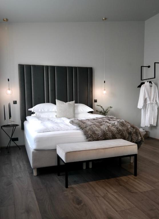 Postel nebo postele na pokoji v ubytování Hotel Vestmannaeyjar