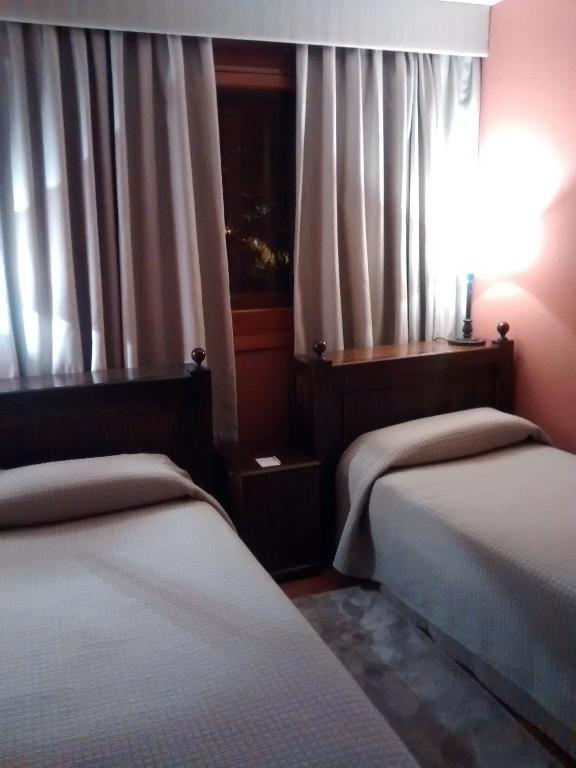 Postel nebo postele na pokoji v ubytování Parador de Artíes