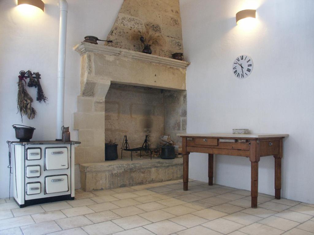 Kuchyň nebo kuchyňský kout v ubytování B&B Masseria Dei 12 Granai
