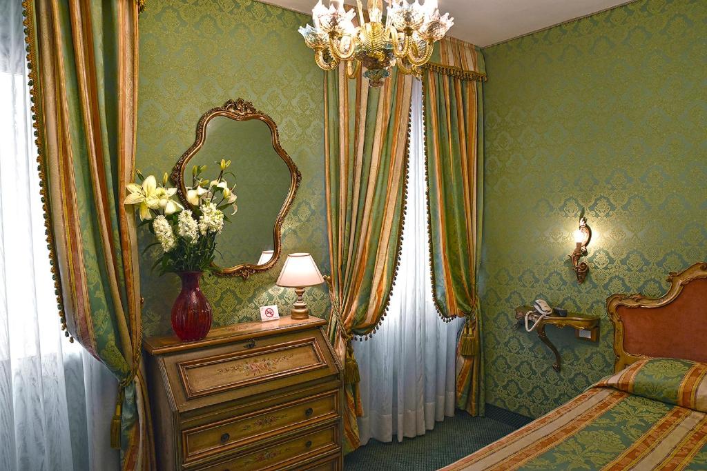 Hotel Bel Sito e Berlinoにあるベッド