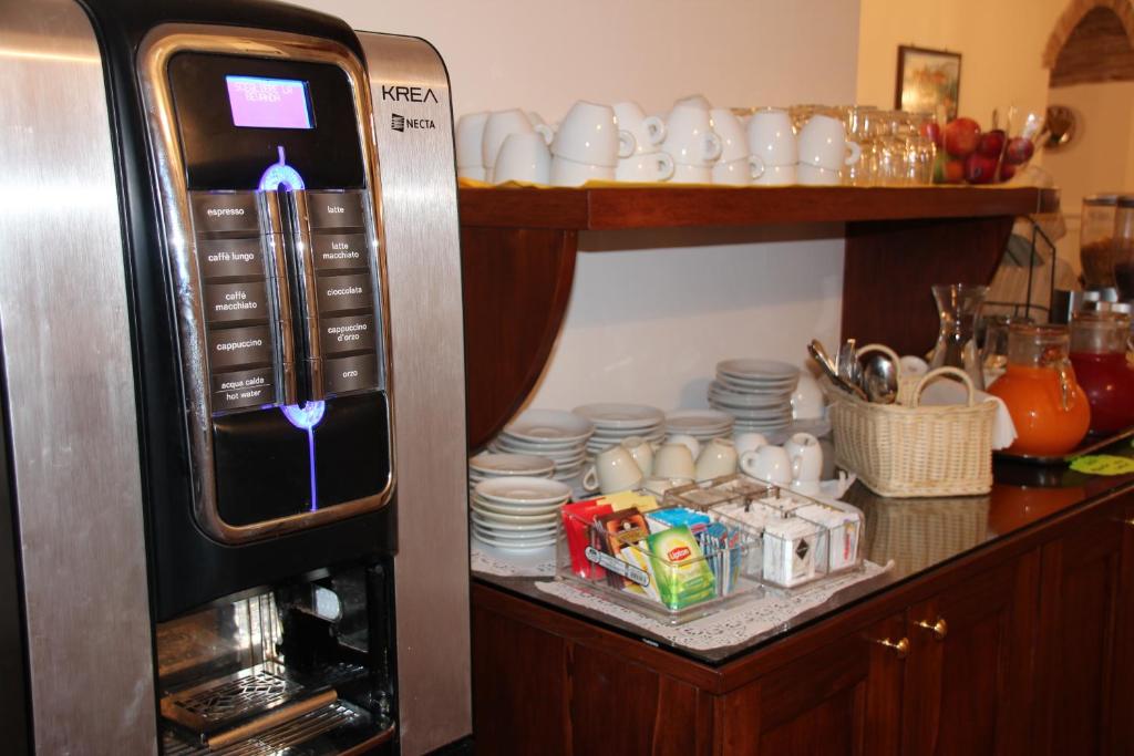 Kuchyň nebo kuchyňský kout v ubytování Hotel Pax