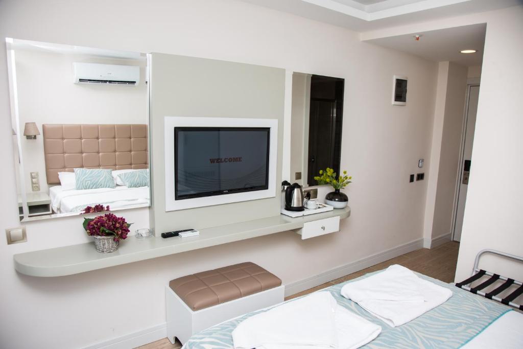 Кровать или кровати в номере Asli Hotel