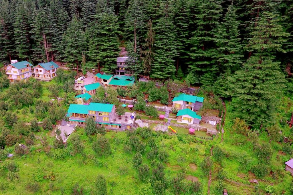 an aerial view of a house on a hill at Amara Resorts Manali in Manāli