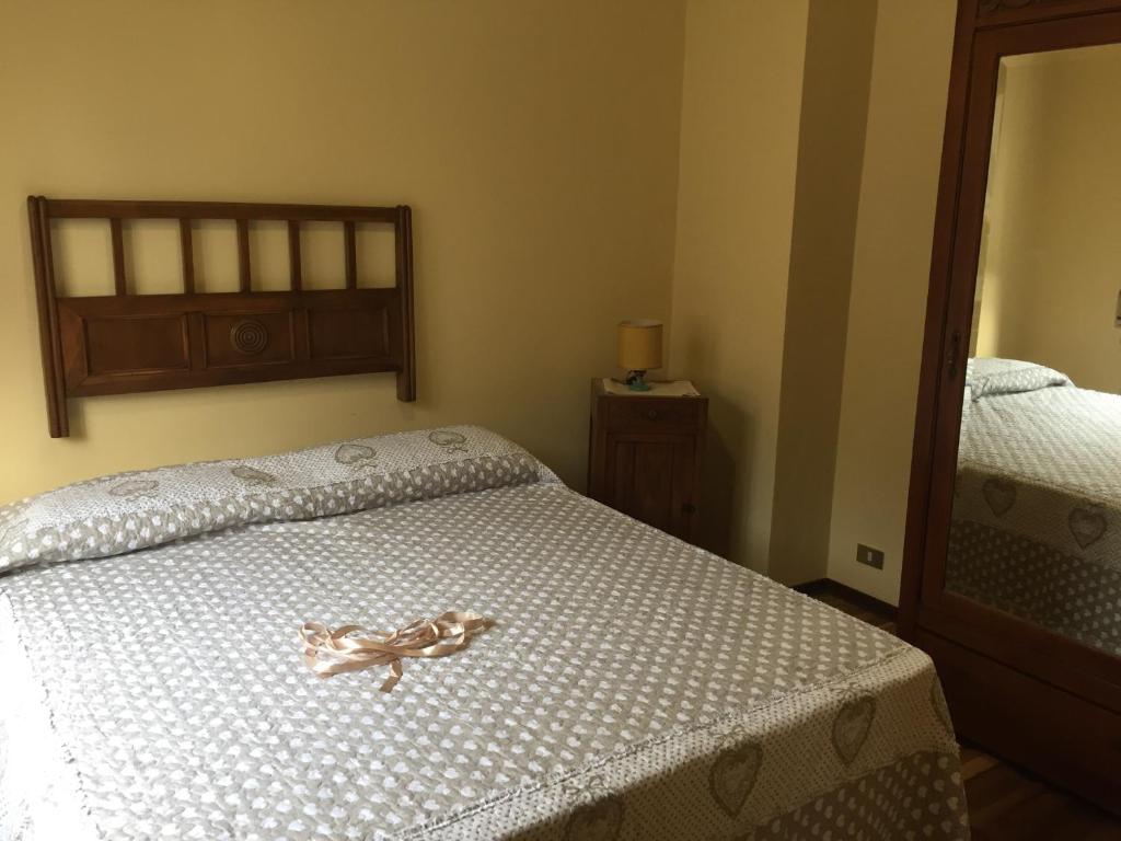 A bed or beds in a room at Da Duccio e Maria