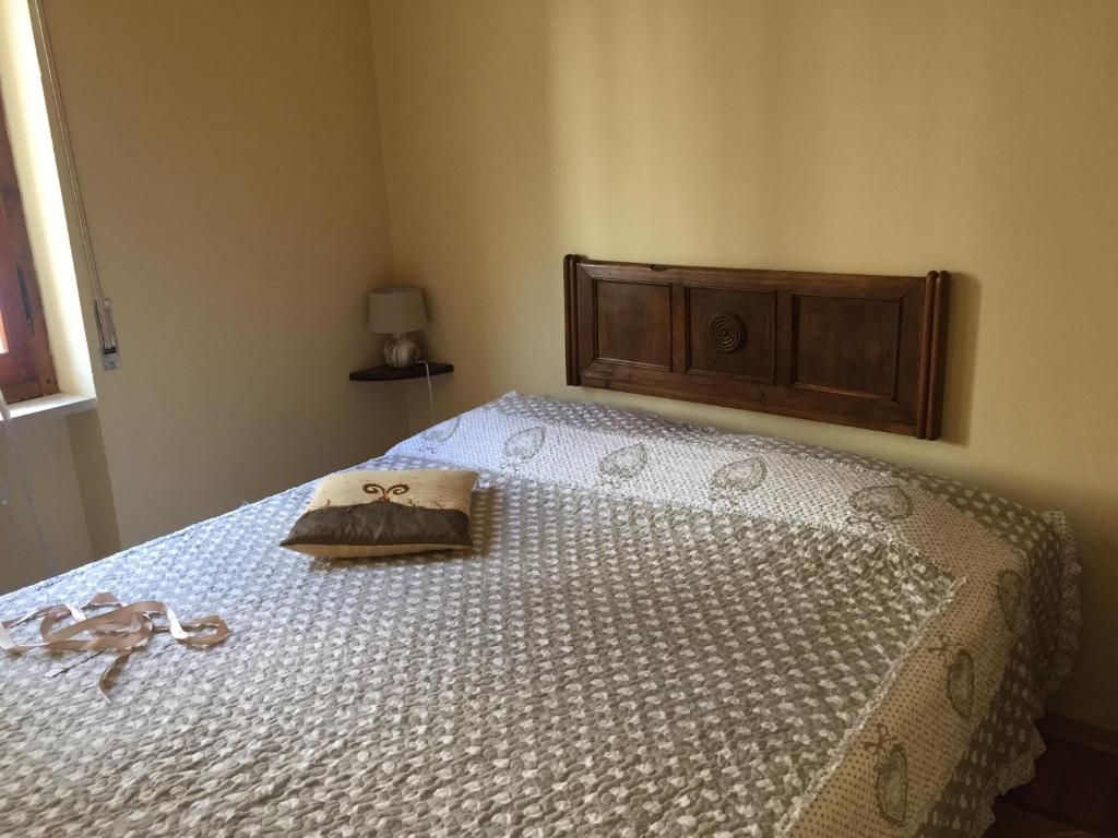 A bed or beds in a room at Da Duccio e Maria