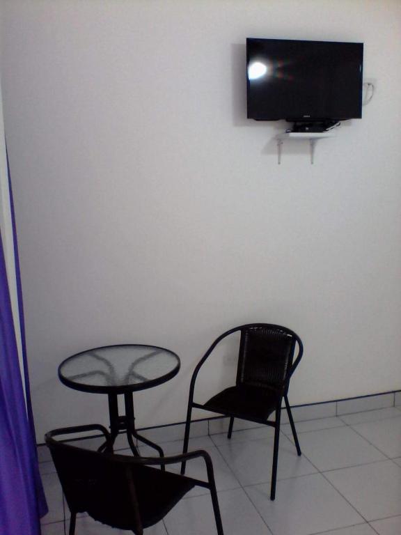 TV a/nebo společenská místnost v ubytování Hotel Las Palmas