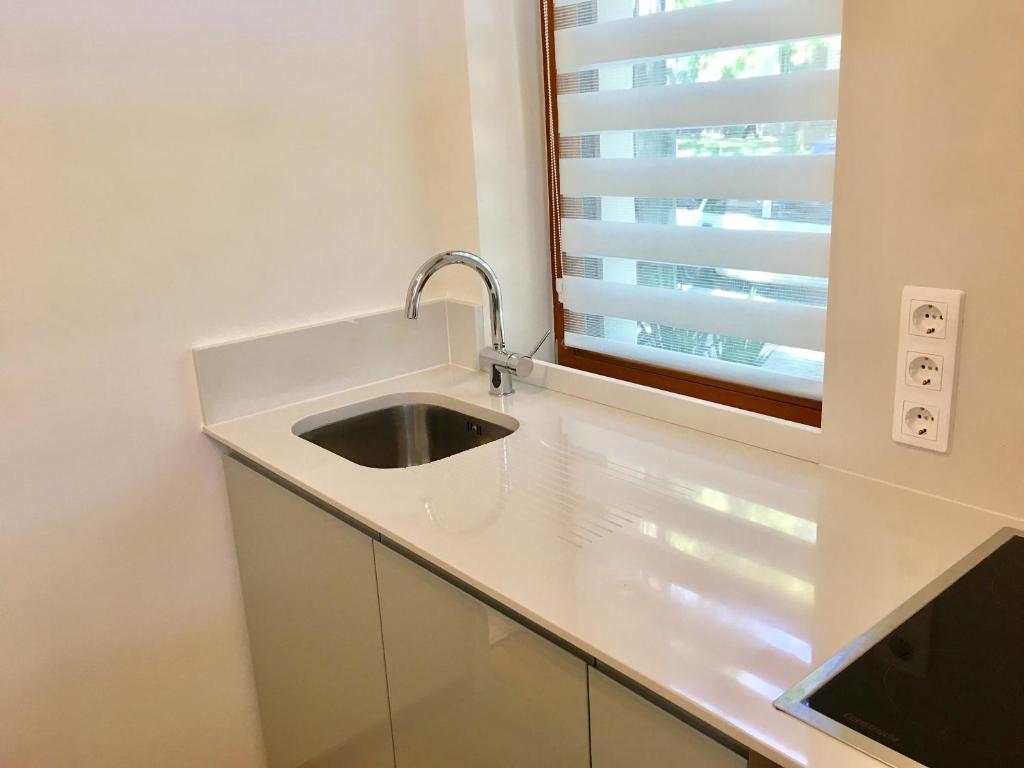 Kuchyň nebo kuchyňský kout v ubytování Apartman Diófa