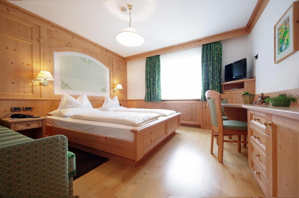 Postel nebo postele na pokoji v ubytování Mountain B&B - La Scalira
