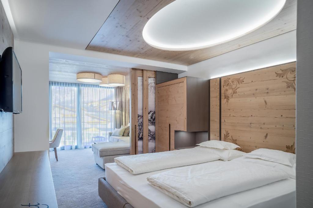 Postel nebo postele na pokoji v ubytování Hotel Gotthard-Zeit