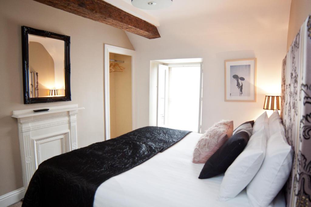 Postel nebo postele na pokoji v ubytování 7 Boutique Hotel