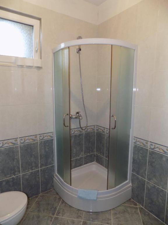 Koupelna v ubytování Apartment Štrbić