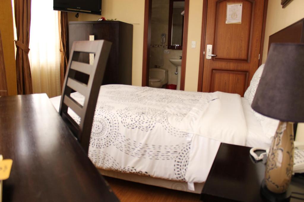 Postel nebo postele na pokoji v ubytování Hotel Joshed Imperial