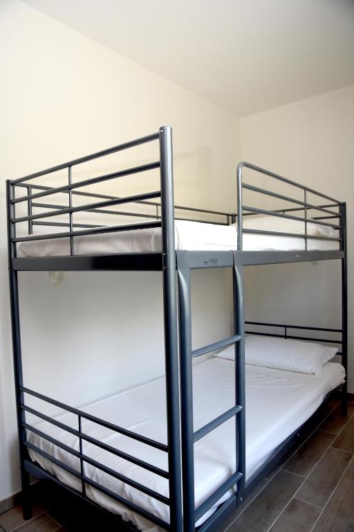 A bed or beds in a room at Bio Forester