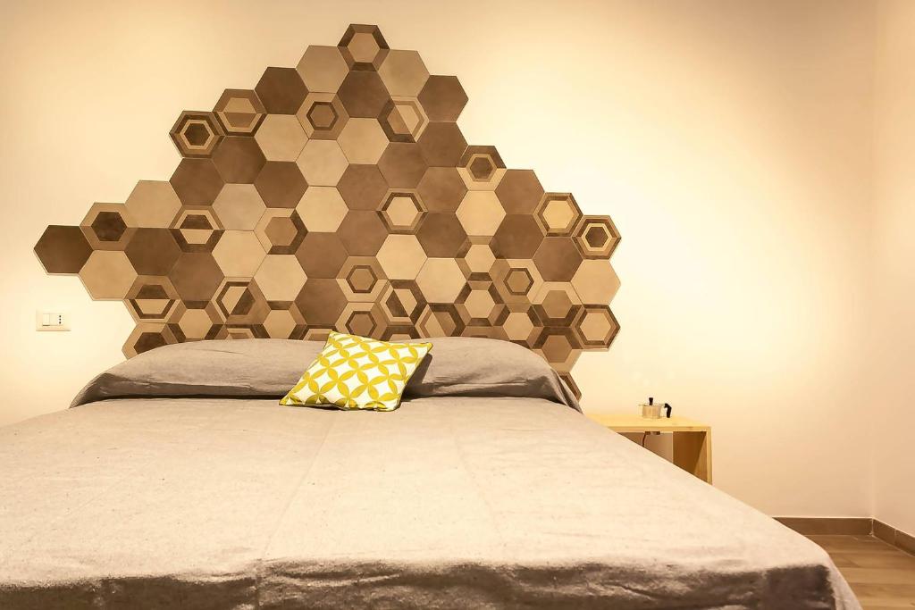 Postel nebo postele na pokoji v ubytování Napoli Boulevard B&B