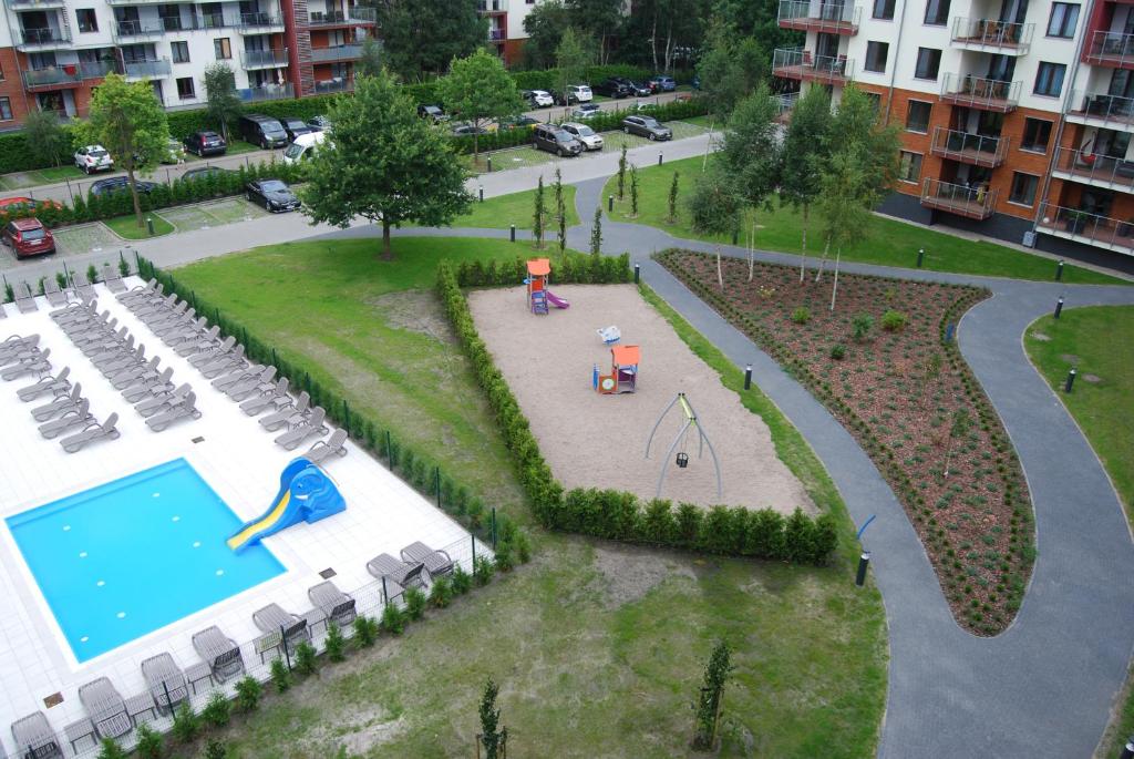 Bazén v ubytovaní Apartament Piaskowy Polanki Park alebo v jeho blízkosti