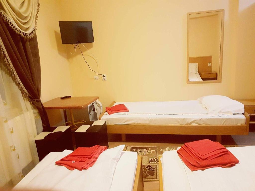 Postel nebo postele na pokoji v ubytování Complex Turistic Gura Jgheabului