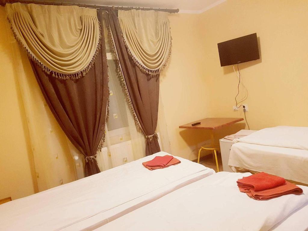 Postel nebo postele na pokoji v ubytování Complex Turistic Gura Jgheabului