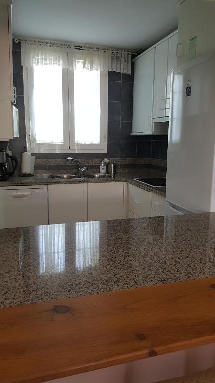 Kuchyň nebo kuchyňský kout v ubytování Townhouse Mar y Sol
