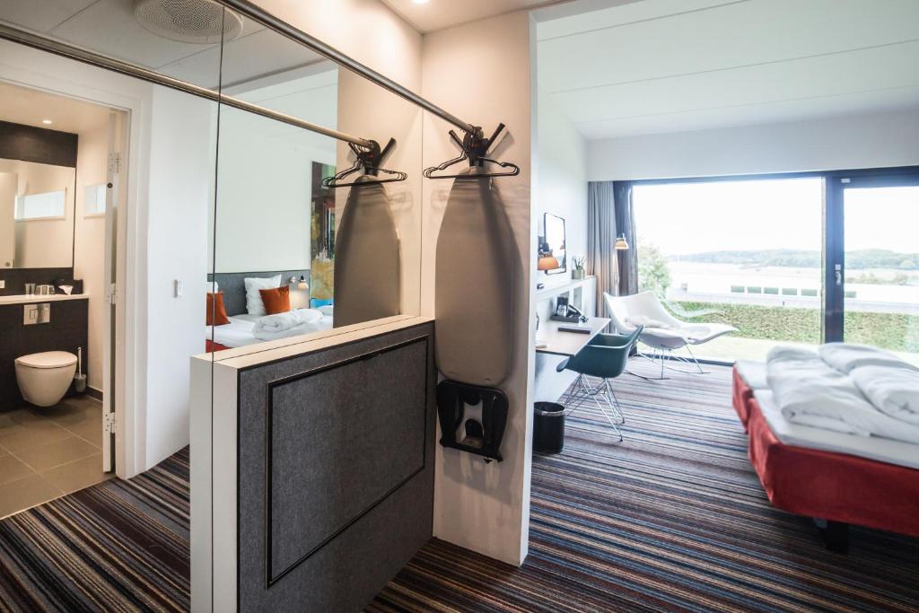 Postel nebo postele na pokoji v ubytování Comwell Roskilde