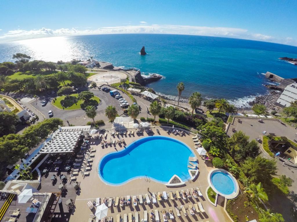 an aerial view of the beach and the ocean at Melia Madeira Mare in Funchal