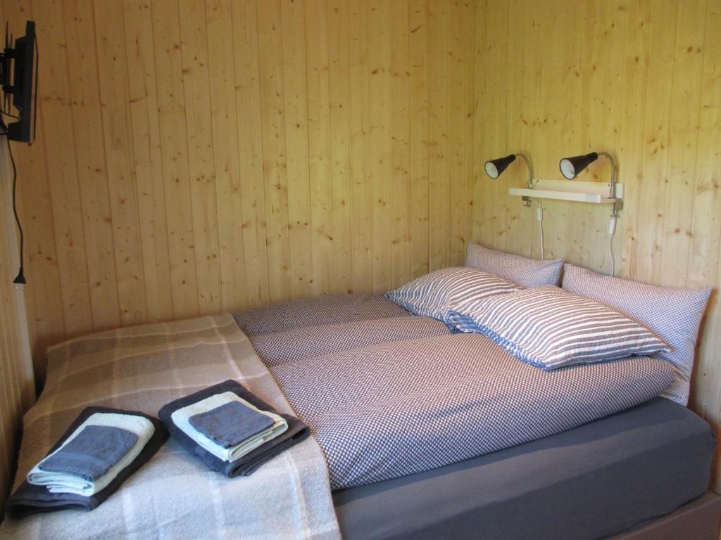 Postel nebo postele na pokoji v ubytování Lækjaborgir Guesthouse