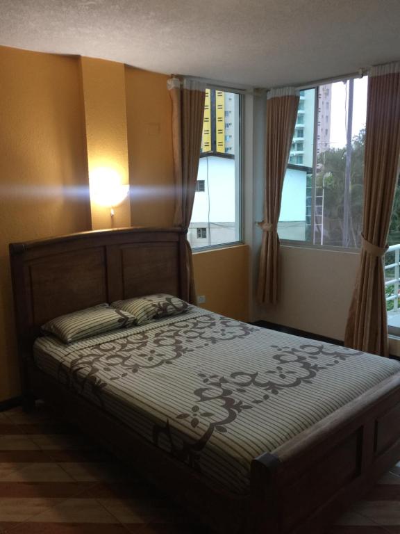 Postel nebo postele na pokoji v ubytování Hotel Kemarios