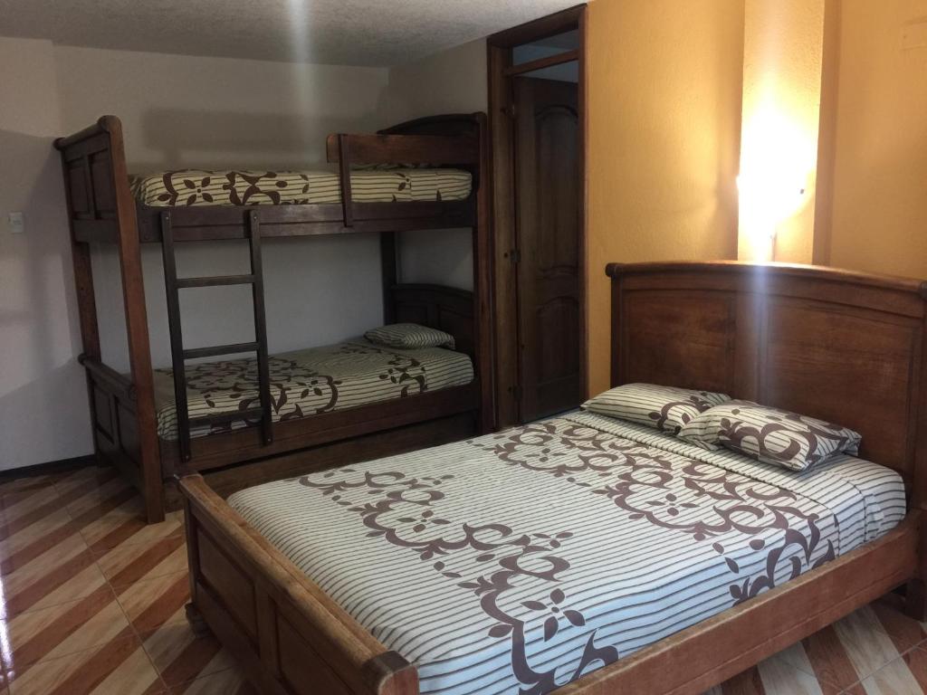Postel nebo postele na pokoji v ubytování Hotel Kemarios