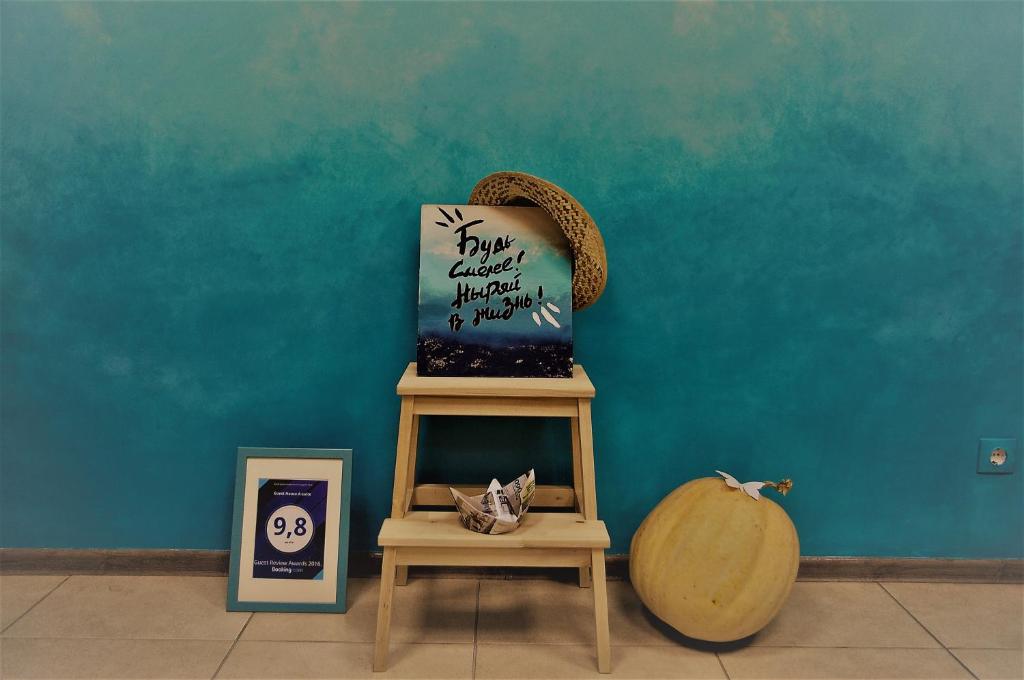 a table with a sign that reads my happiest moment is a pumpkin at Guest House A-suite in Omsk