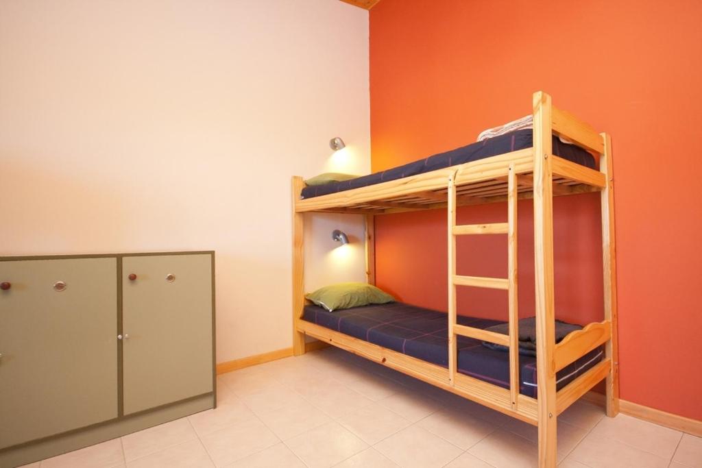 Postel nebo postele na pokoji v ubytování El Gualicho Hostel