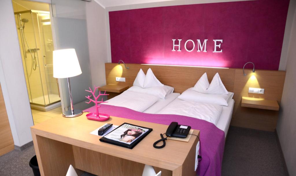 Postel nebo postele na pokoji v ubytování Hotel Moserhof