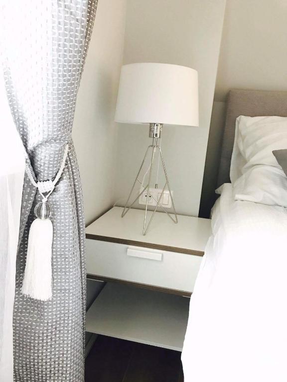 Łóżko lub łóżka w pokoju w obiekcie Apartamenty Platinum