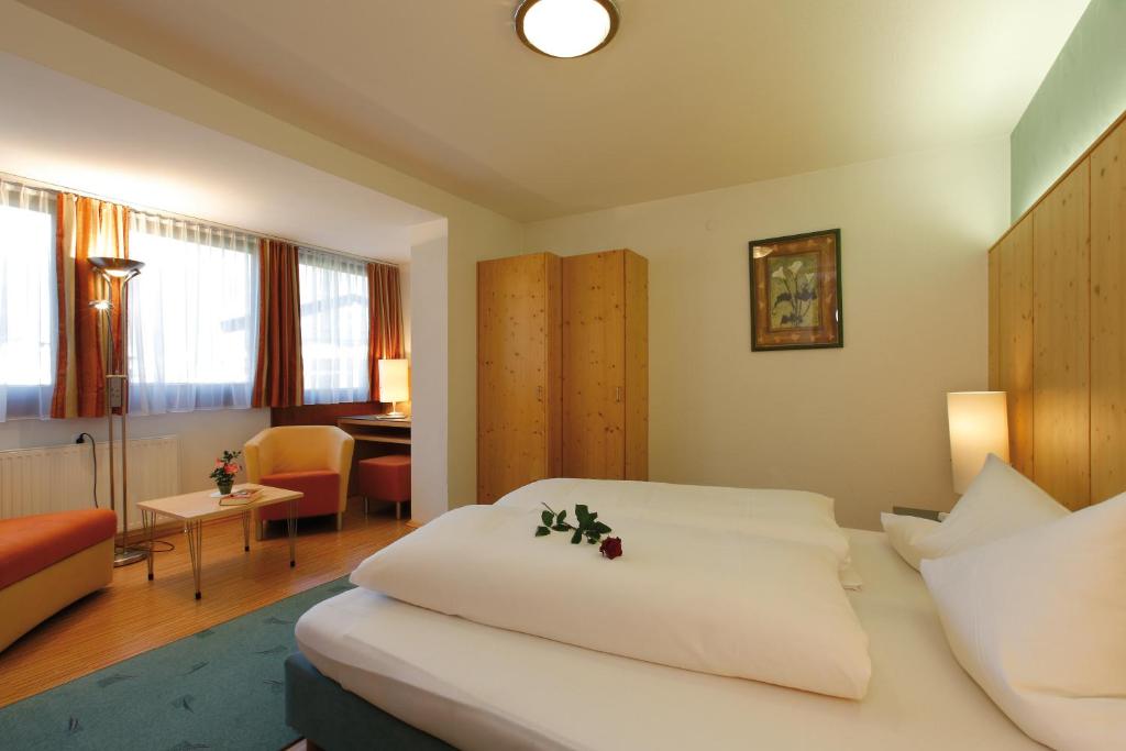 Łóżko lub łóżka w pokoju w obiekcie Hotel Das Zentrum