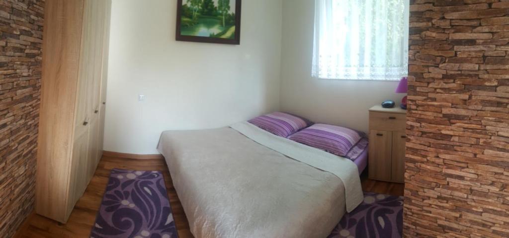 Posteľ alebo postele v izbe v ubytovaní Domek Miłka