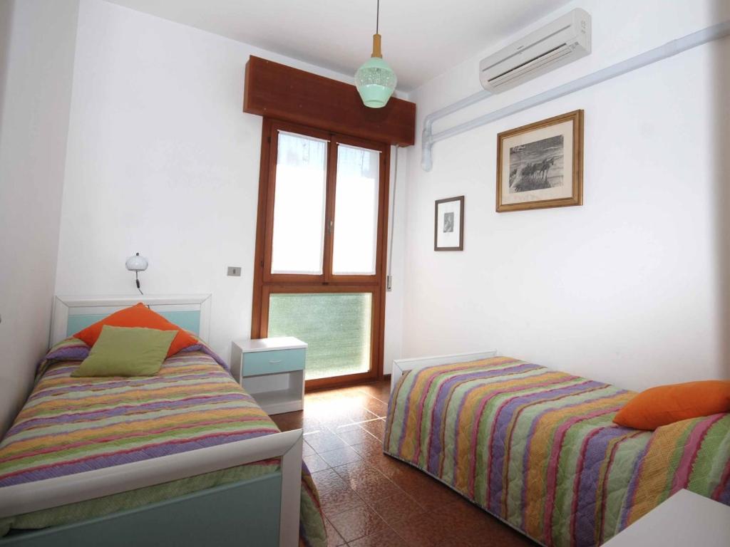A bed or beds in a room at Villa Liliana