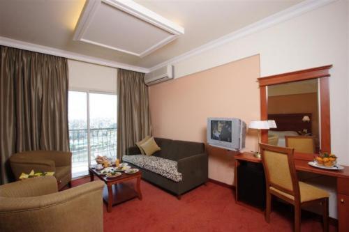 TV a/nebo společenská místnost v ubytování Padova Hotel