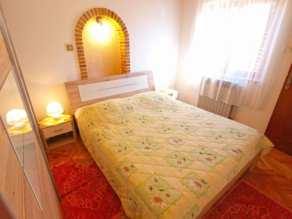 Postel nebo postele na pokoji v ubytování Apartments Milan 1457