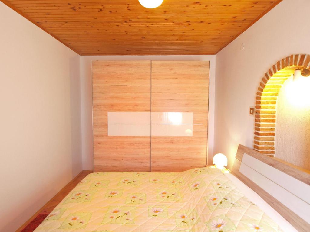 Postel nebo postele na pokoji v ubytování Apartments Milan 1457