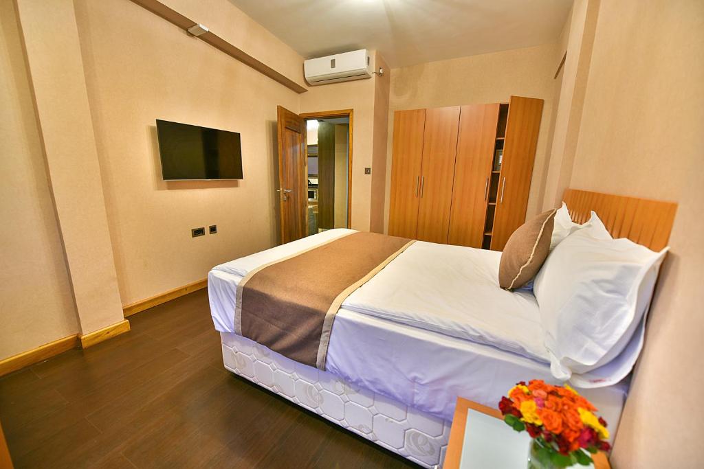 Speke Apartments Wampewoにあるベッド