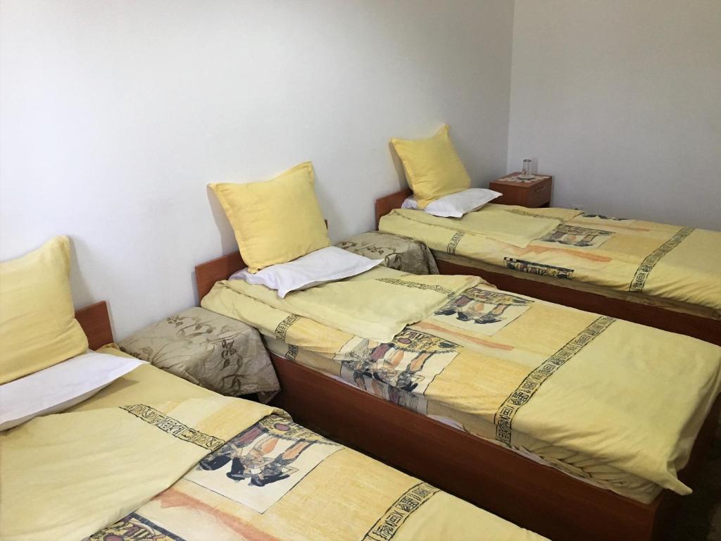 Postel nebo postele na pokoji v ubytování Danubian