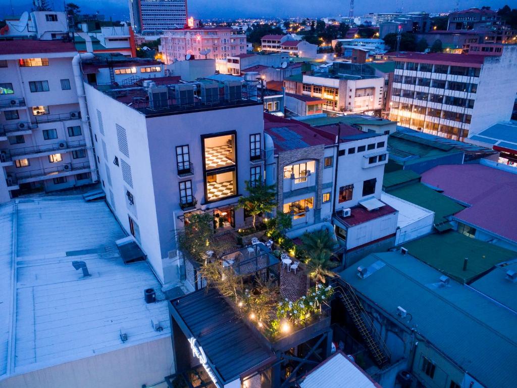 an aerial view of a city at night at Hotel Presidente in San José