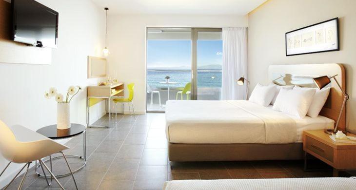 Postel nebo postele na pokoji v ubytování Margarita Sea Side Hotel