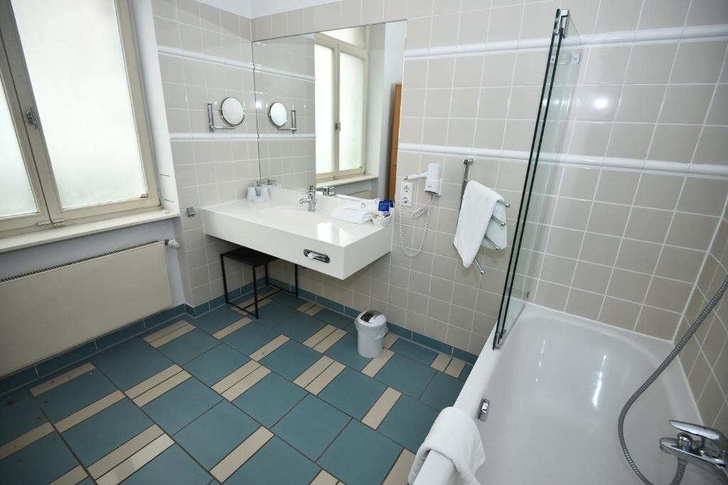 Koupelna v ubytování Art-Hotel Robert Mayer