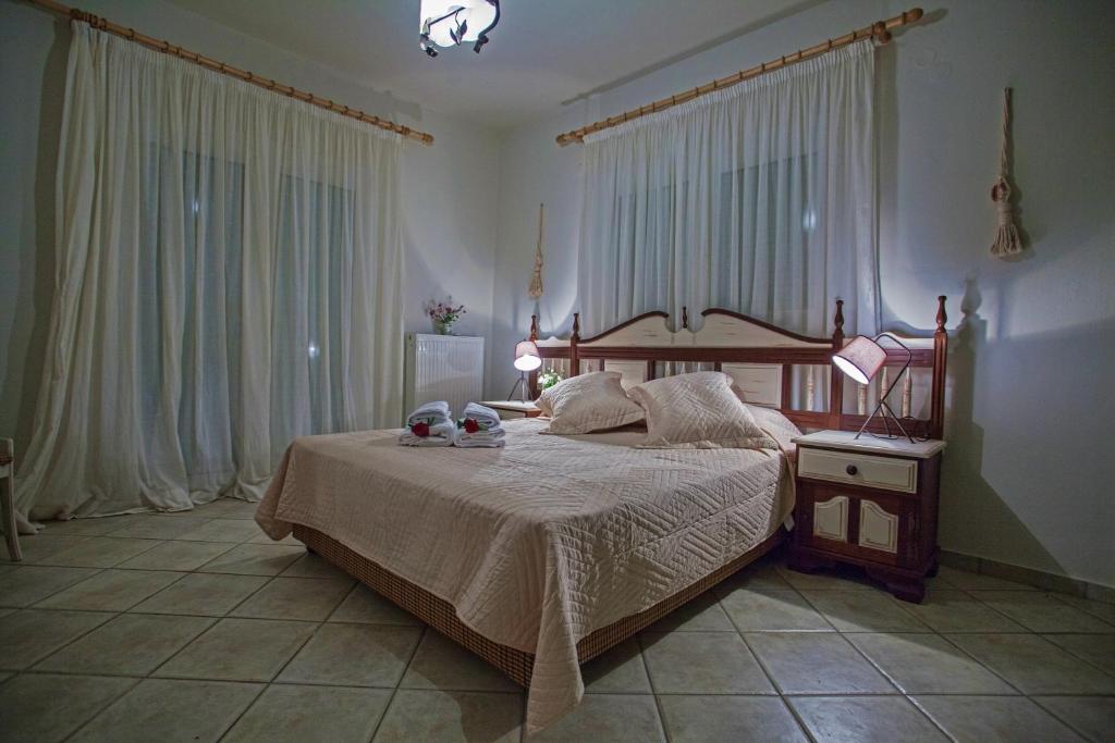Postel nebo postele na pokoji v ubytování Villa Gerrito