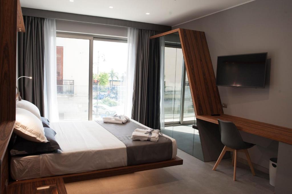 A bed or beds in a room at B&B Rakel Home