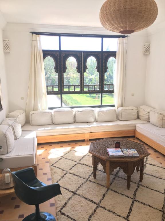 Posezení v ubytování La Maison des Ailleurs