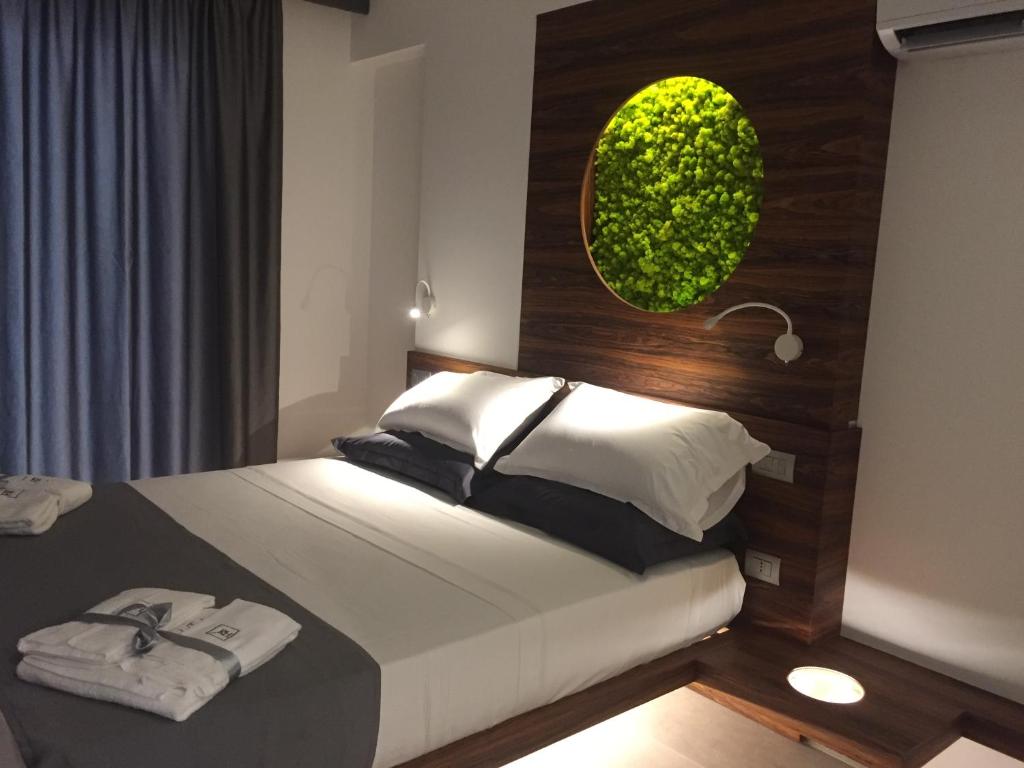 A bed or beds in a room at B&B Rakel Home